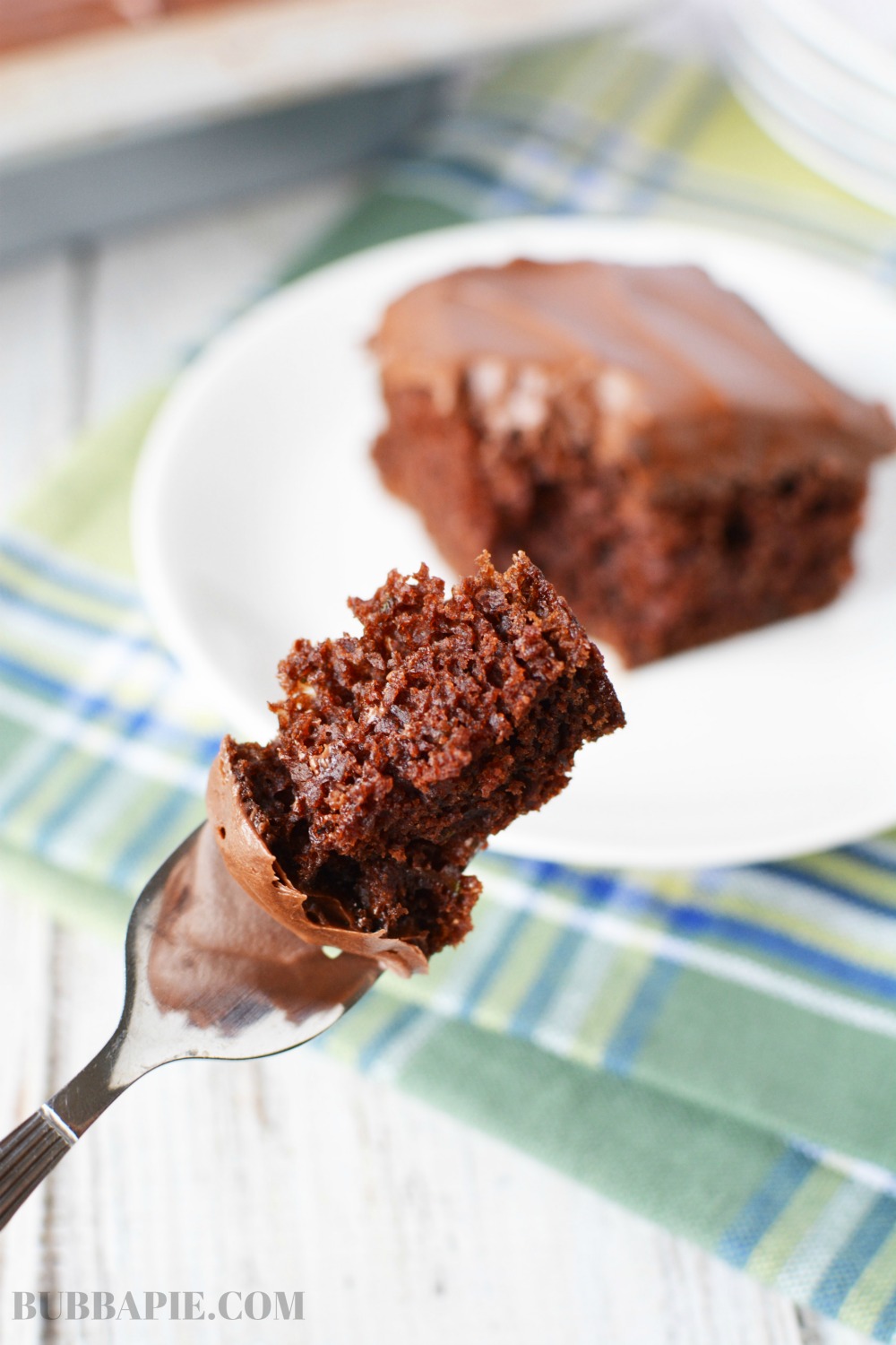 Easy chocolate Zucchini Cake being served on a fork.