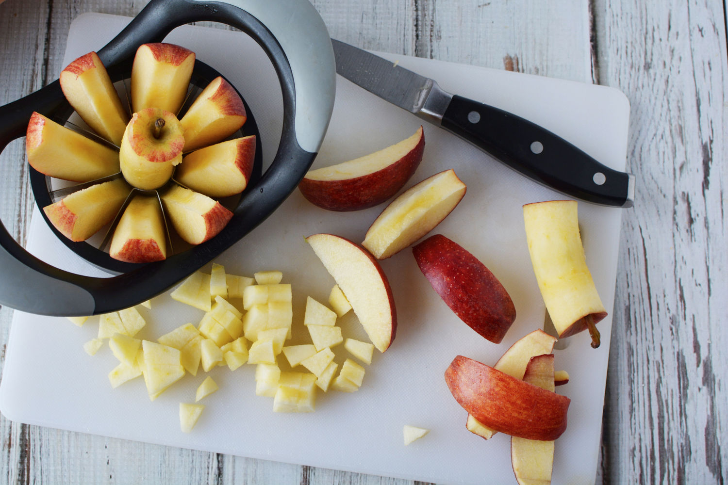 Butternut Squash soup with apple being prepared on a cutting board.