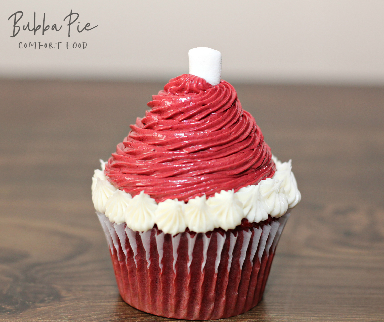 Easy Santa Hat Cupcakes Recipe topped with a mini marshmallow