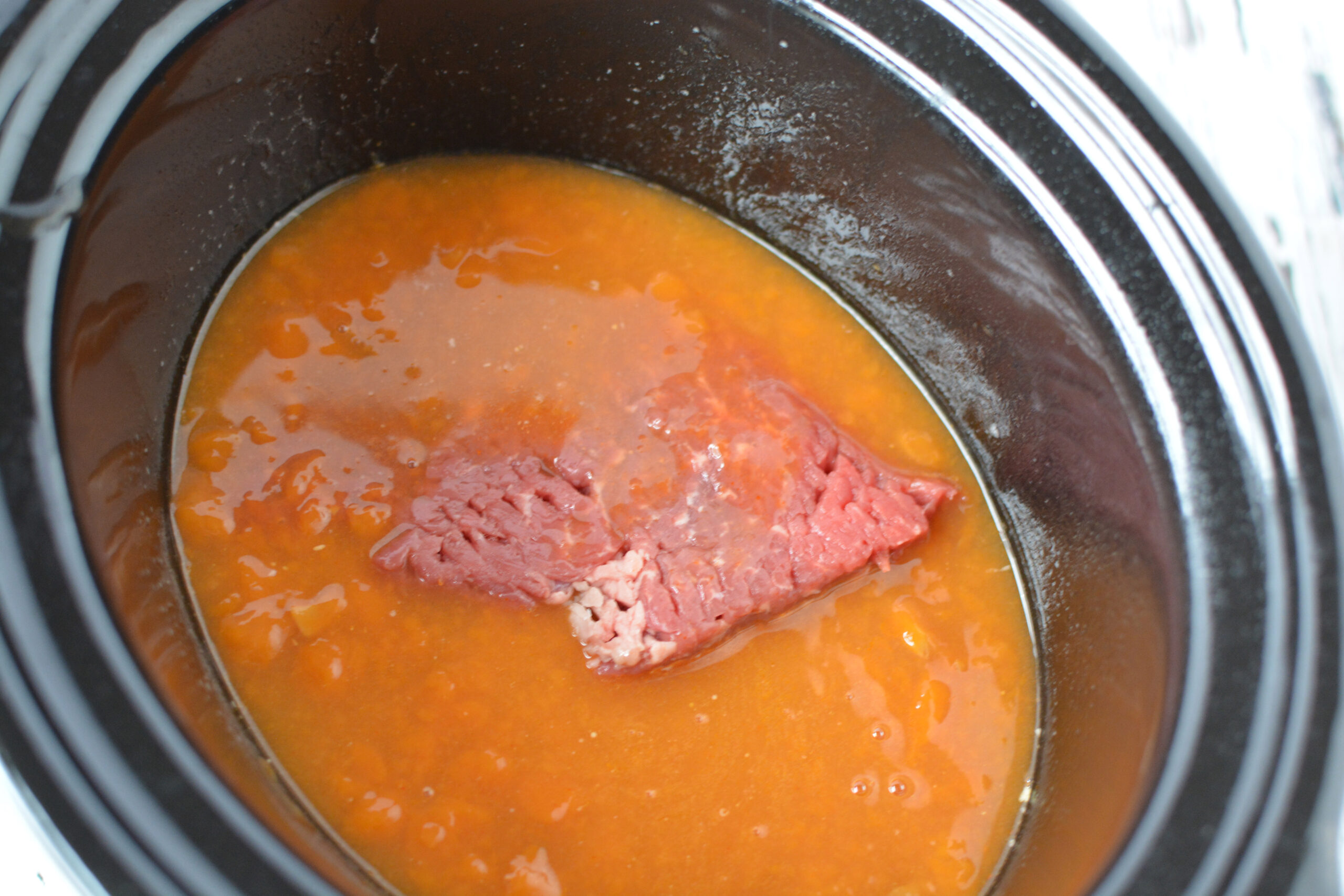 Add Cube Steak and Cover with Soup Mixture