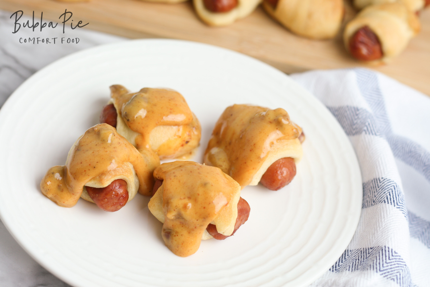 mini pigs in a blanket recipe is the perfect appetizer or idea for an office pitch in.