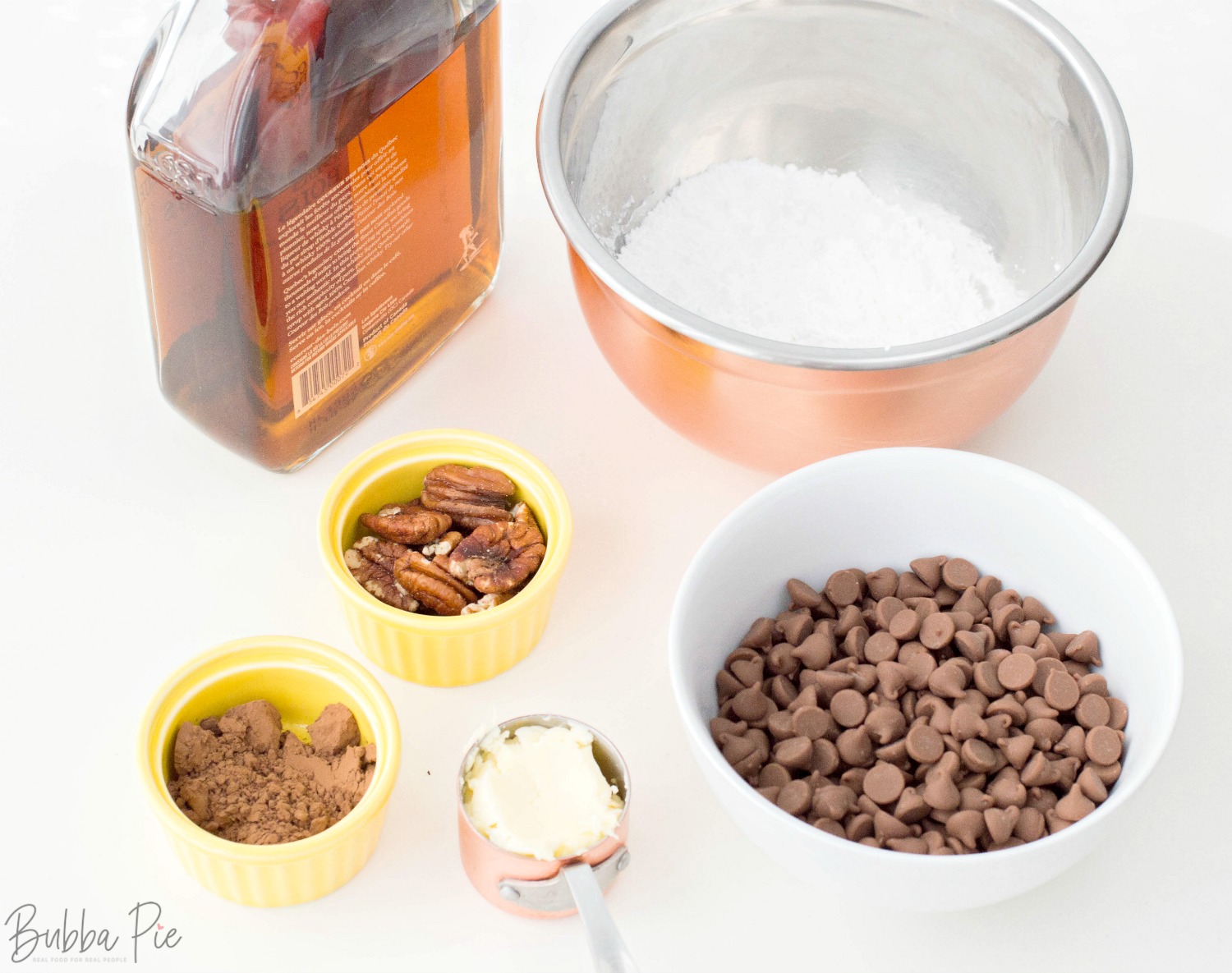 Bourbon Balls Recipe includes crushed pecans, chocolate chips, butter and sugar