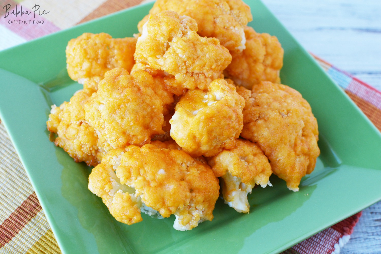 Buffalo Cauliflower Bites out of the oven and ready to enjoy. Much healthier than traditional wings!