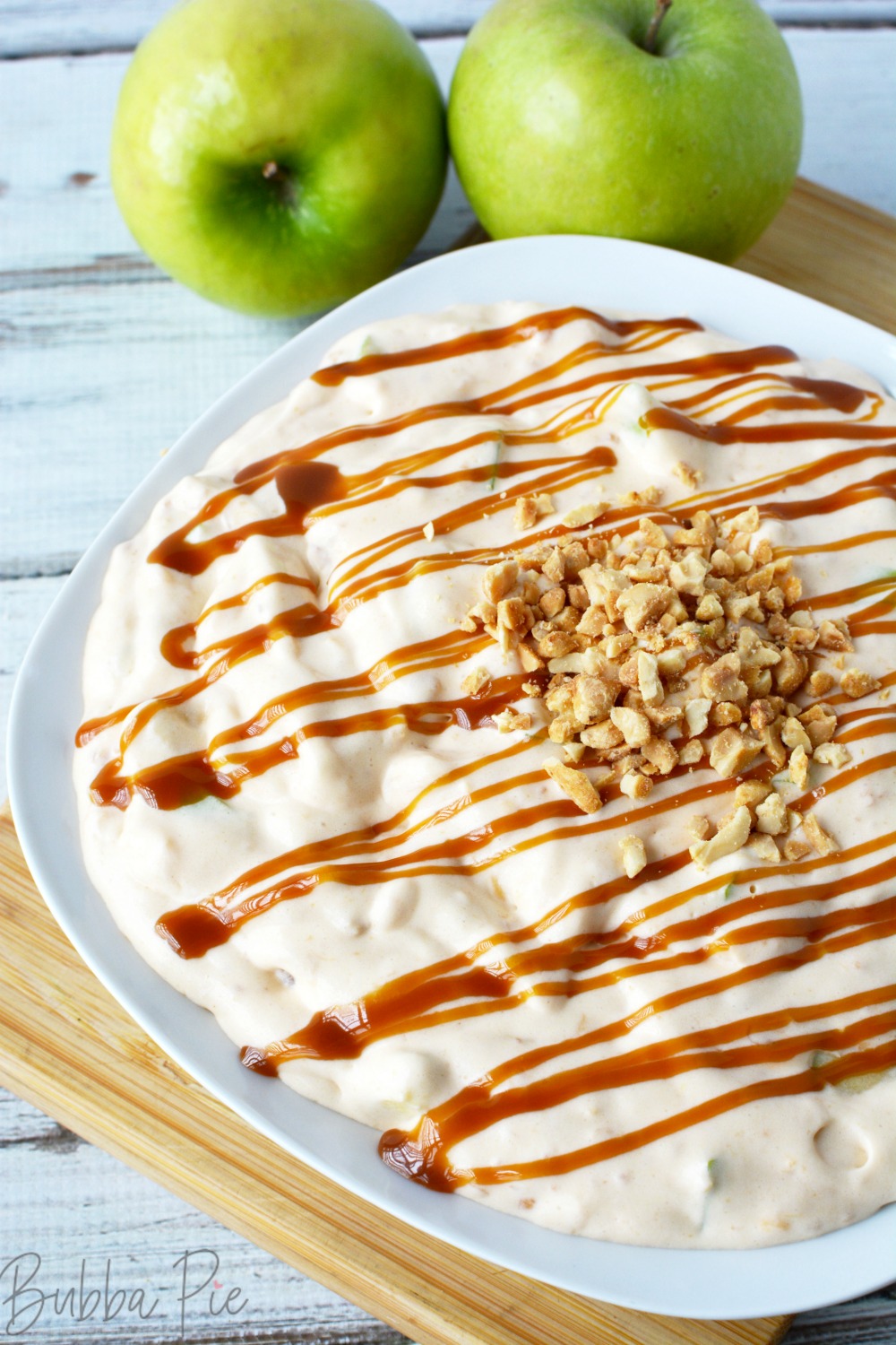 Caramel Apple Salad is topped with nuts and caramel sauce