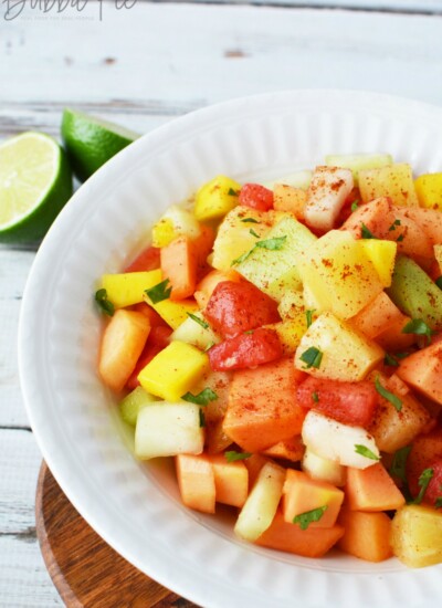 Mexican Fruit Salad is made with tropical fruit and a chili lime sauce