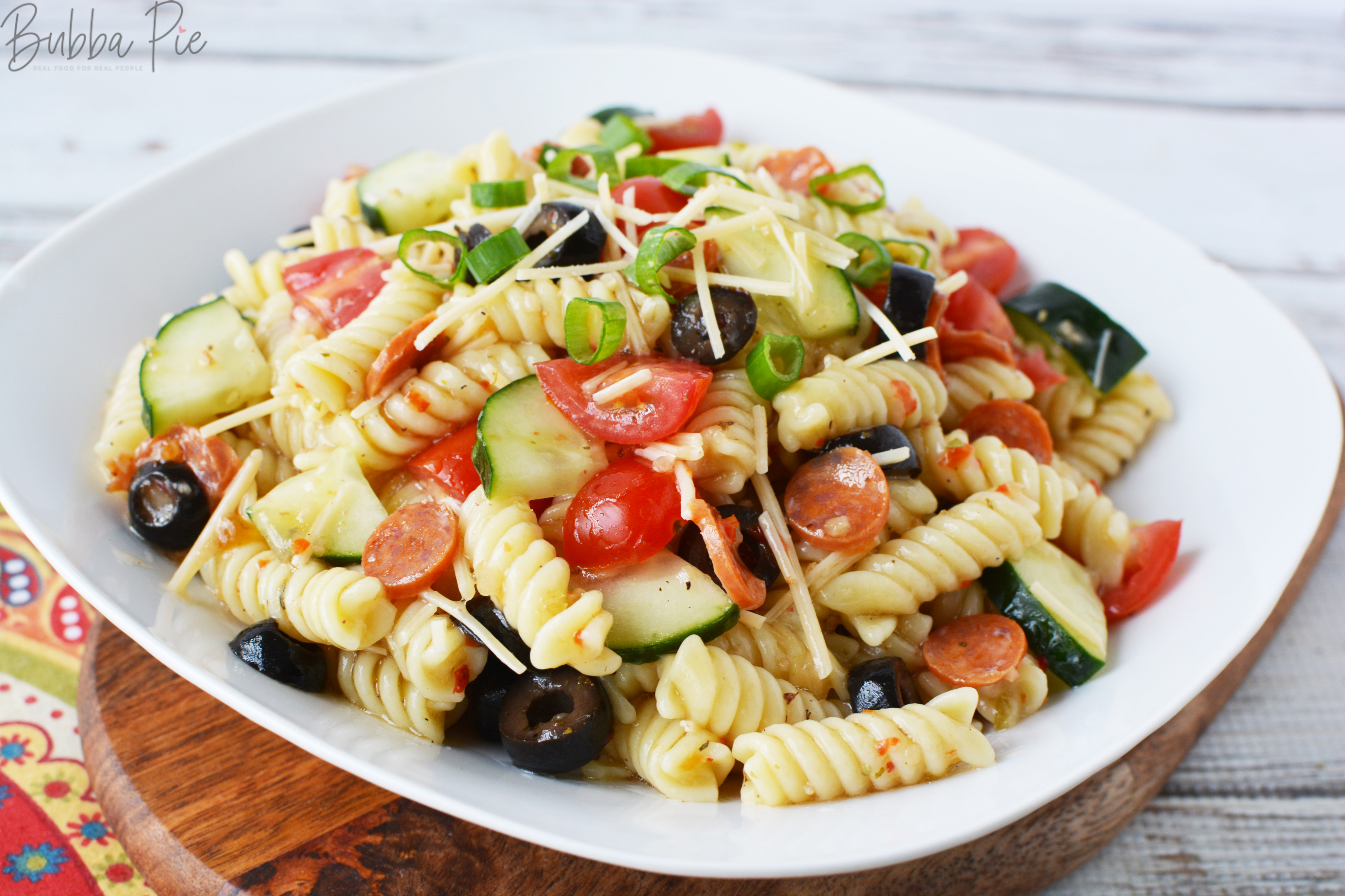 Rotini Pasta Salad Recipe sitting on a plate with a napkin