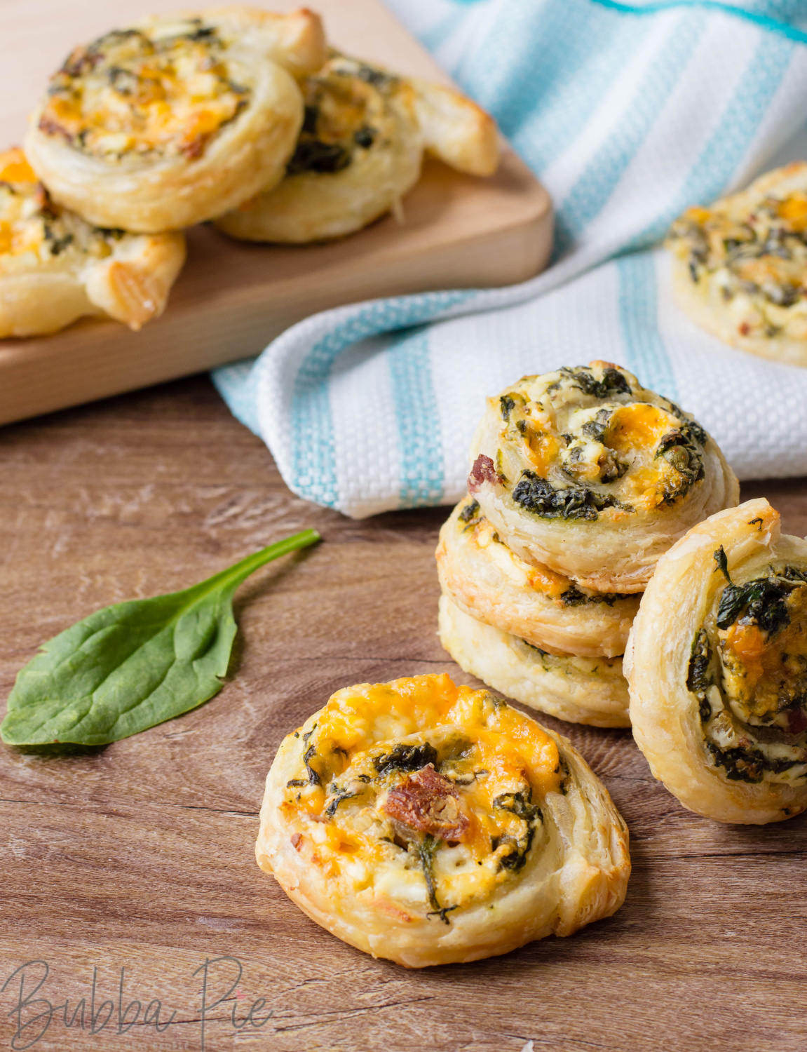Spinach and bacon pinwheel sandwich recipe is the perfect appetizer for a party or a pitch in