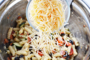 Stir cheese into Rotini Pasta Salad