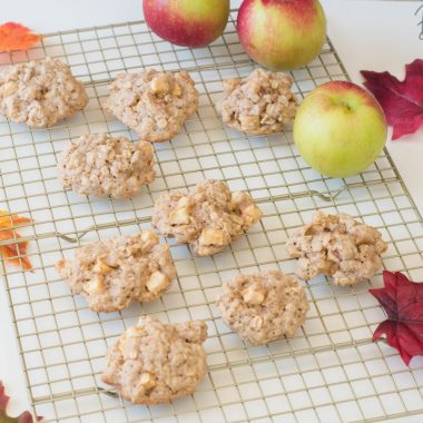 Apple Oatmeal Cookies Sitting on a cooling rack surrounded by Fall decorations