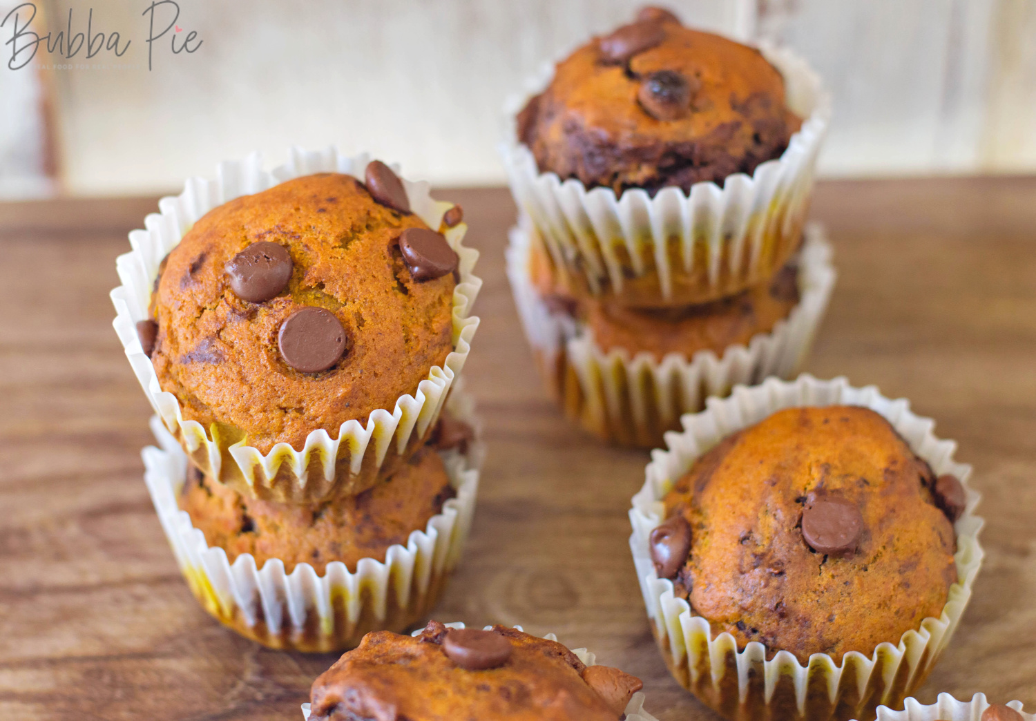 Pumpkin Chocolate Chip Muffins Recipe mixes decadent chocolate chips with pumpkin spice.