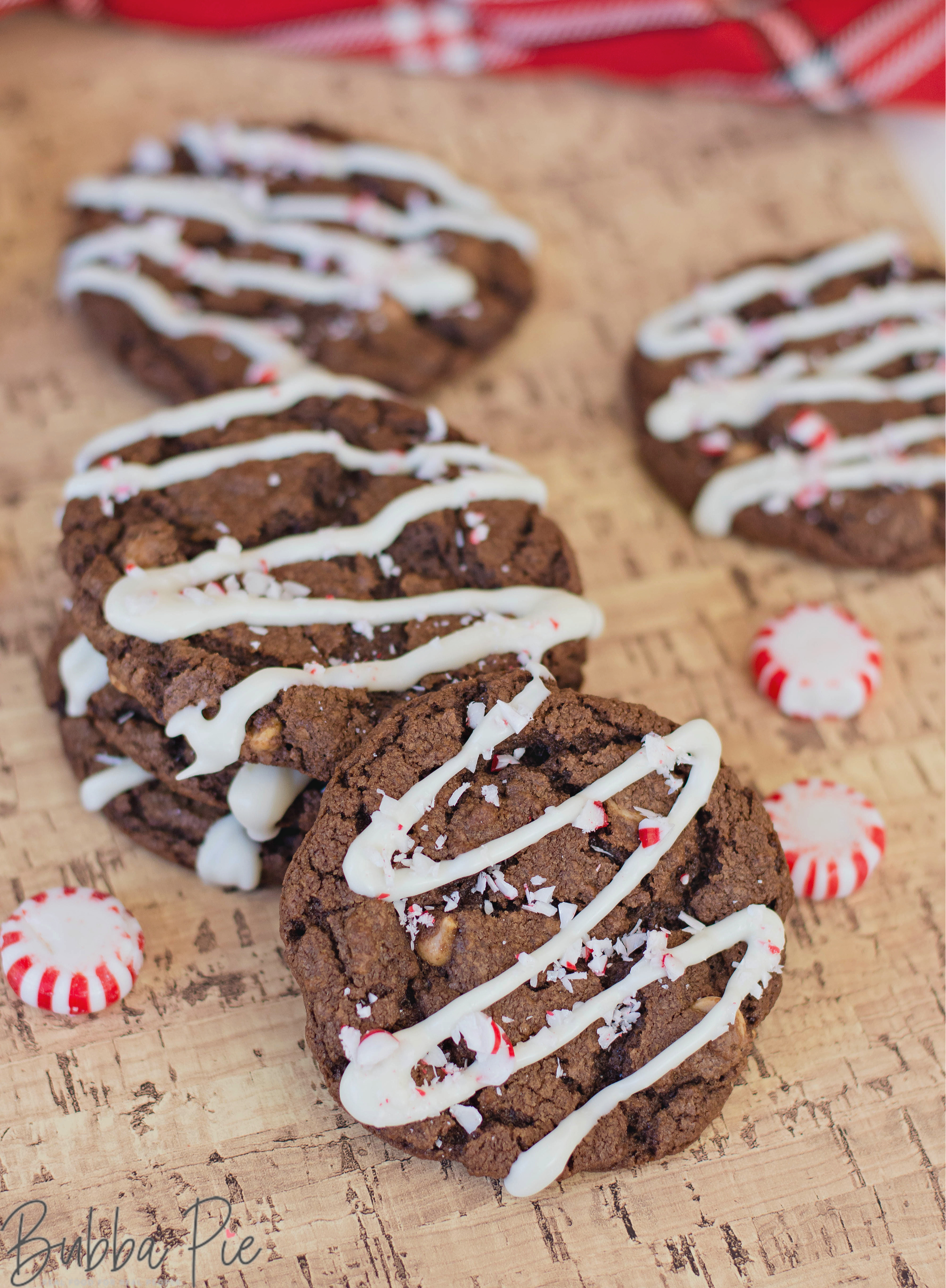 Easy Chocolate Peppermint Cookies sitting on a table with peppermint candies