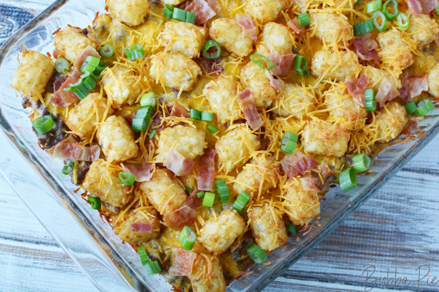 Bacon Cheeseburger Tater Tot Casserole sitting on a table ready to serve for dinner