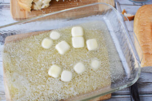 Cubed butter in bottom of casserole