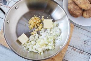 cook onion, garlic and butter over medium heat