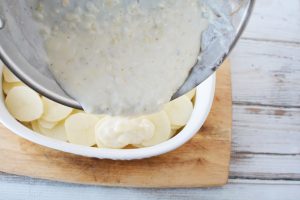top potatoes with scalloped mixture