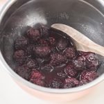 Mix together blackberries, water and sugar.