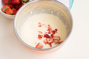 fold strawberries in to cream cheese