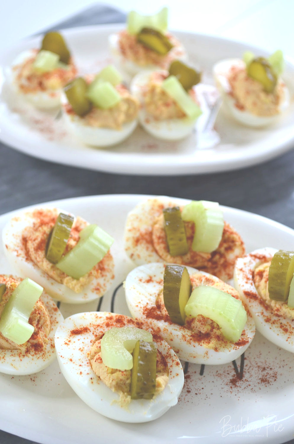 Spiked Deviled Eggs are made to taste just like a bloody mary.
