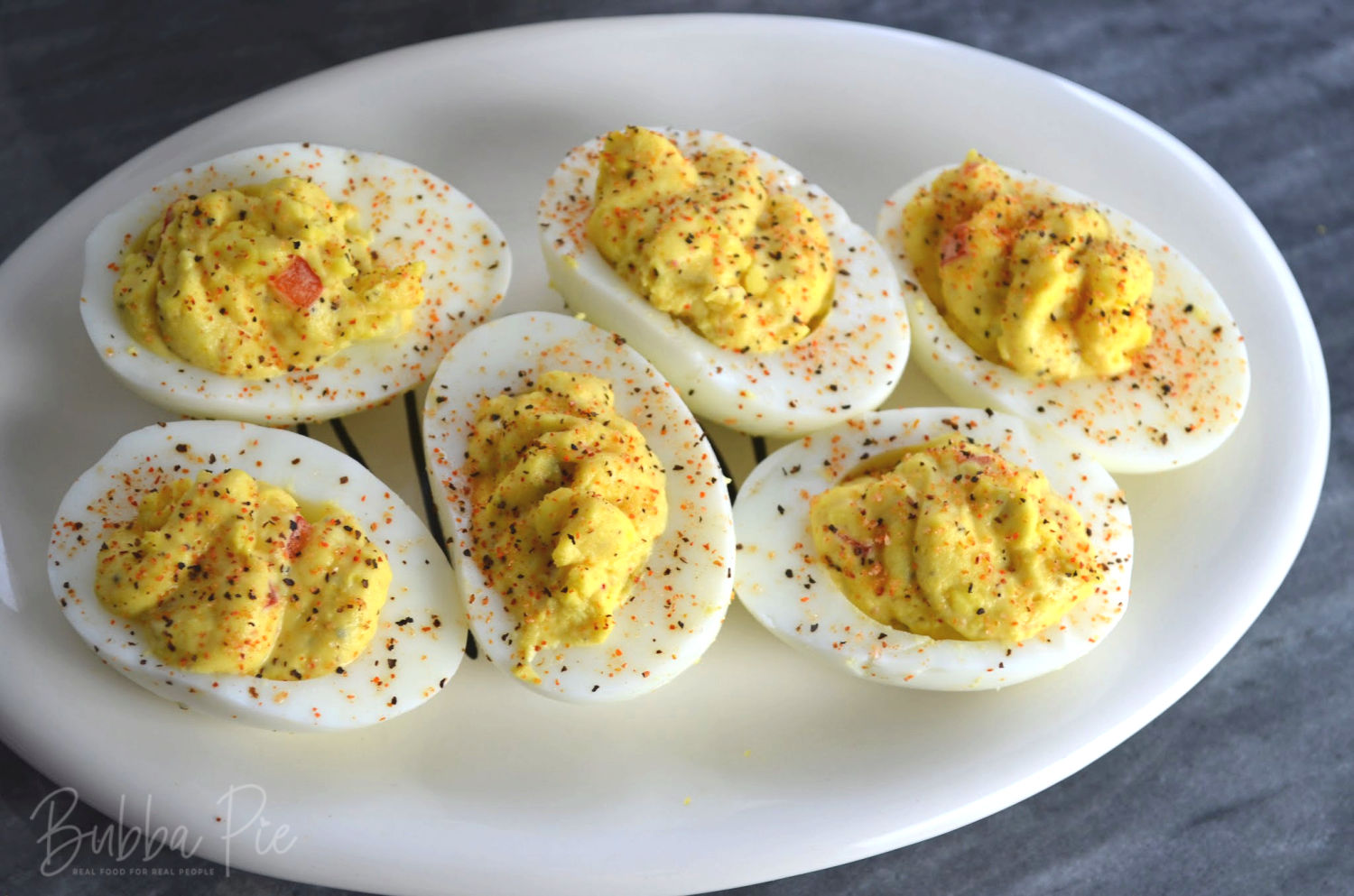 cajun deviled eggs puts a spicy twist on this classic appetizer