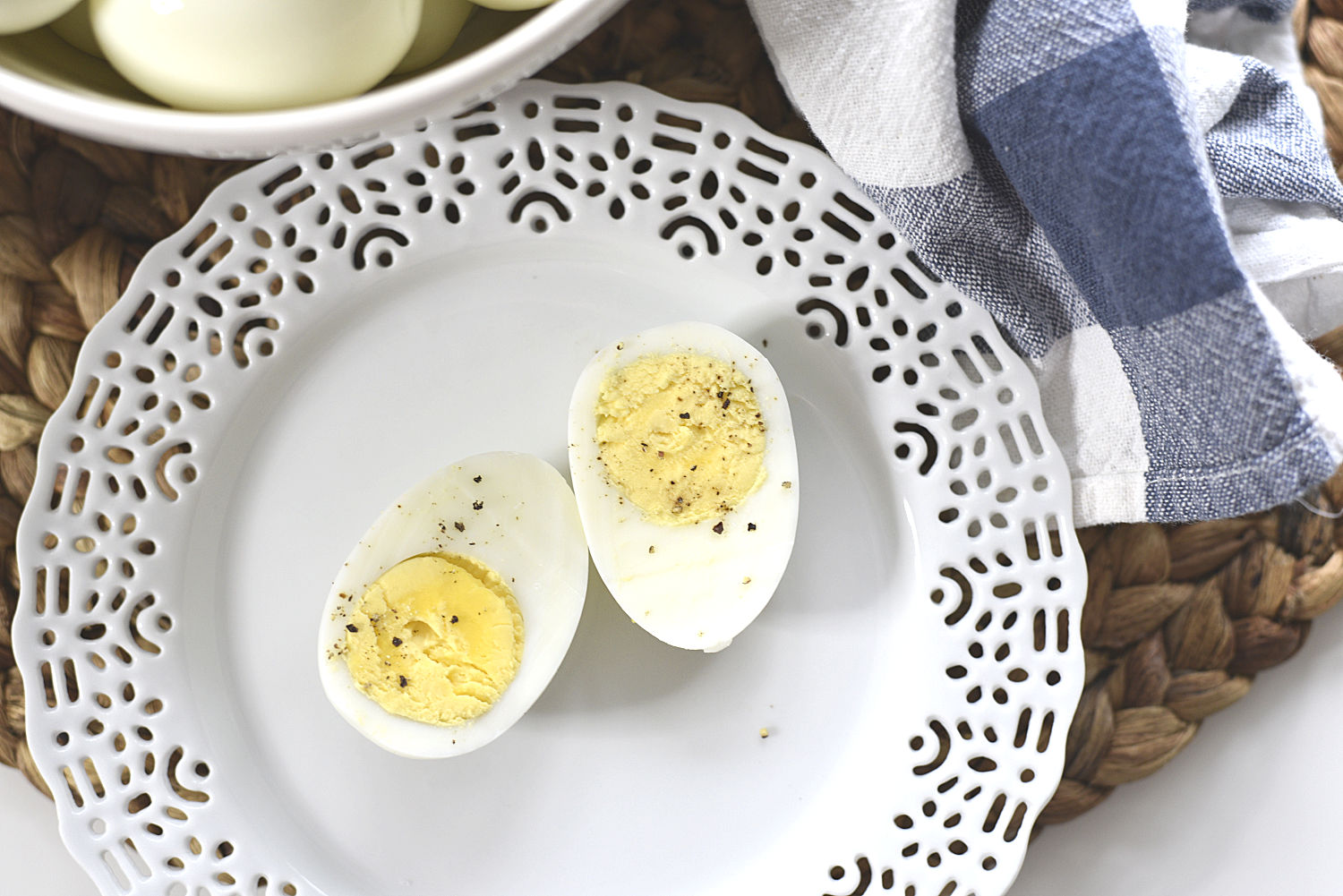 a plate with a hard boiled egg cut in half