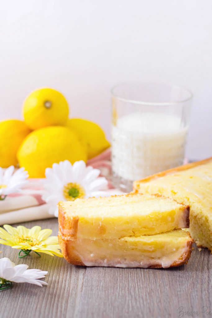 Lemon Loaf Cake served as dessert with a glass of milk.