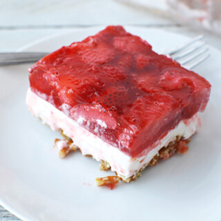 Strawberry Pretzel Salad sitting on a plate ready to be served for dessert.