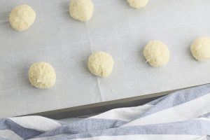 Scoop out dough onto parchment lined cookie sheet.