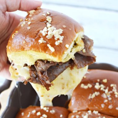 French Dip Sliders Recipe is made with roast beef, provolone cheese and caramelized onions.