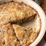 Impossible Cheeseburger Pie is made with ground beef, cheese, onion and bisquick.