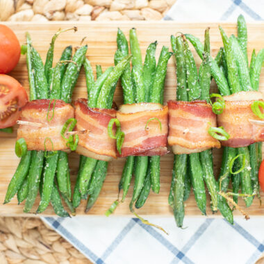 Bacon Wrapped Green Bean Bundles with a maple glaze being served for Thanksgiving.