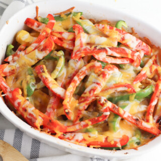 Chicken Fajita Casserole Recipe being served for dinner in a white dish.