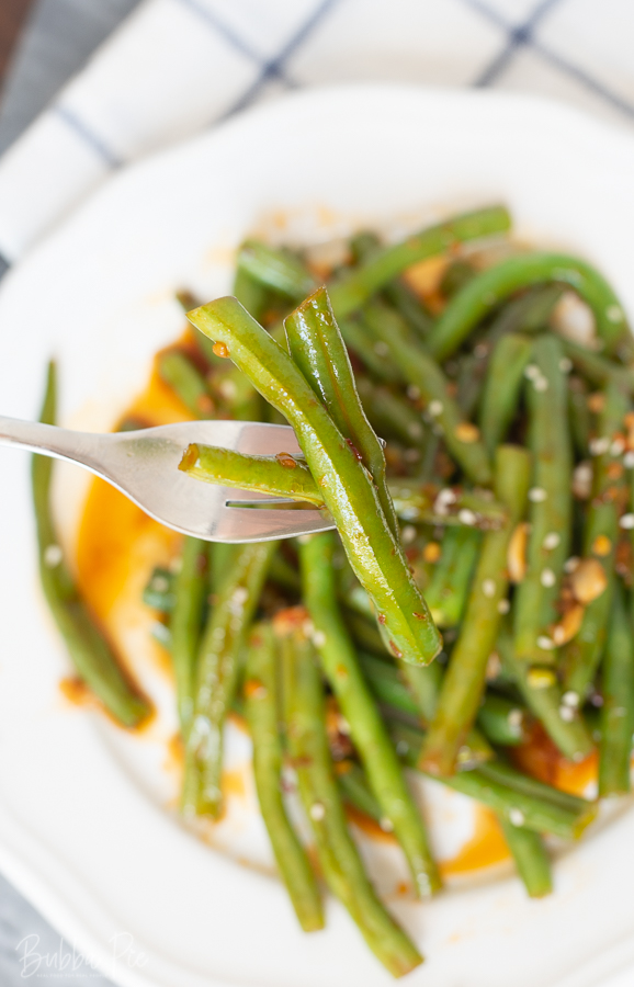 Garlic Chili Green Beans being served as a side dish for dinner.