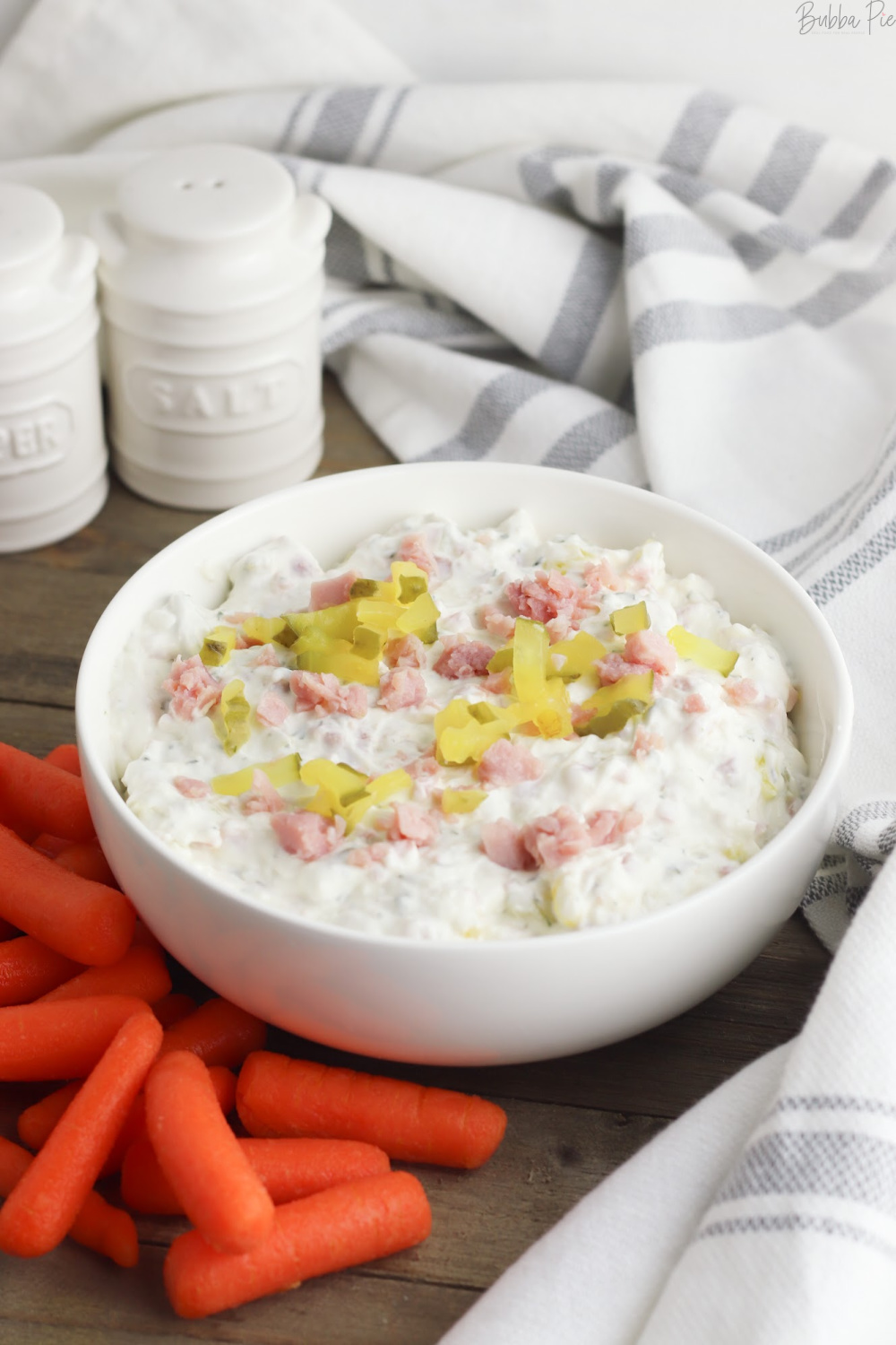 Ham and Pickle Dip Recipe being served with potato chips as an appetizer.