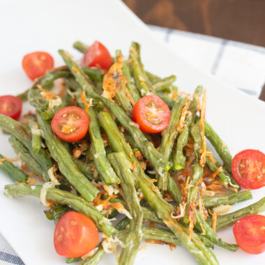 Oven Roasted Green Beans being served as a holiday side dish.