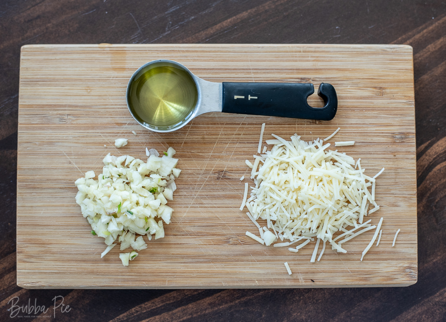 Oven Roasted Green Beans Ingredients are olive oil, garlic and parmesan cheese.