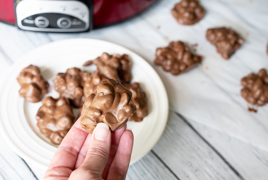 Slow Cooker Christmas Peanut Clusters are an easy and fun Christmas dessert recipe.