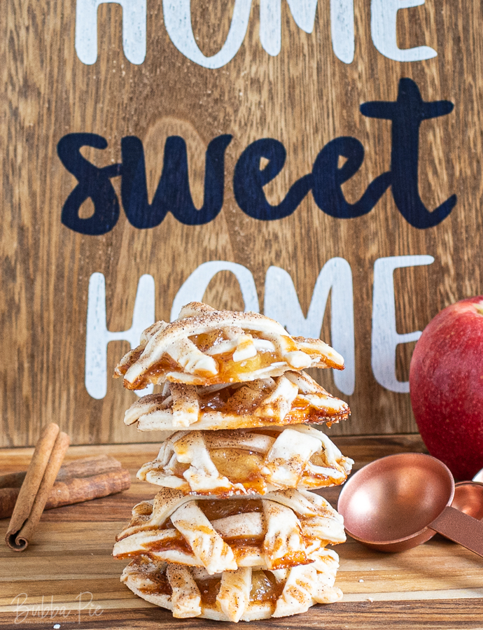 Mini Apple Pies being served with Fall decorations.