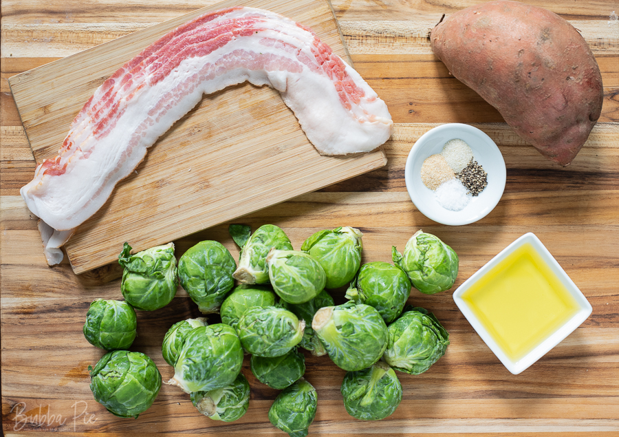 Roasted Brussels Sprouts with Sweet Potatoes Ingredients include olive oil, bacon and seasonings.