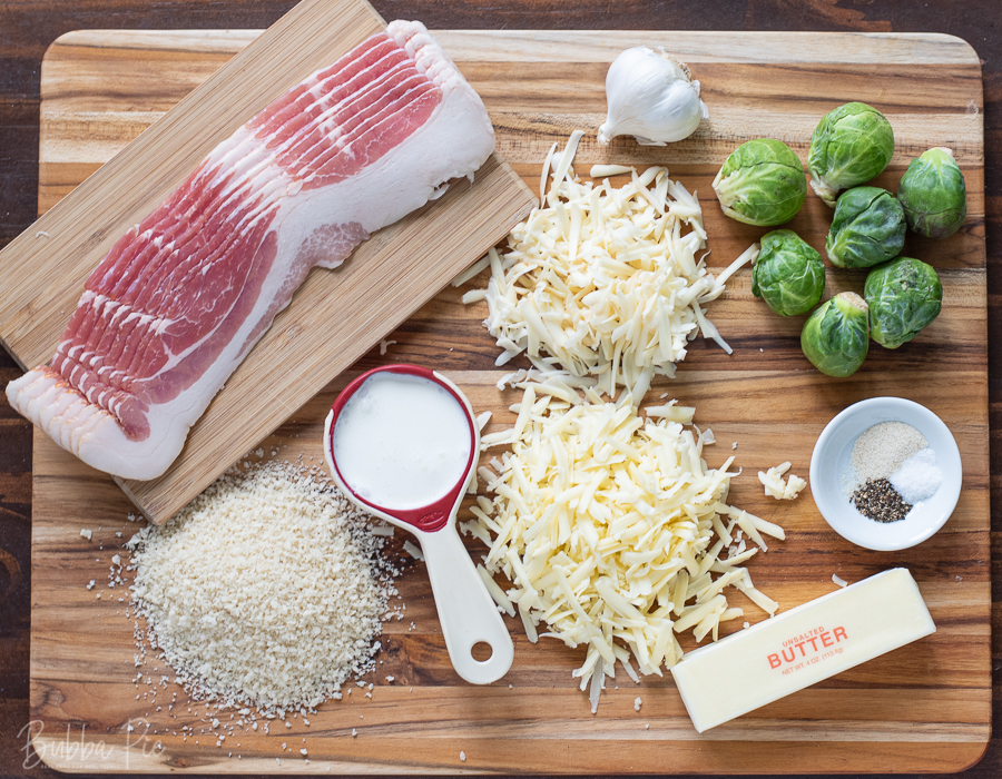 Cheesy Brussel Sprouts Casserole Ingredients include panko bread crumbs, bacon, butter and cheese. 