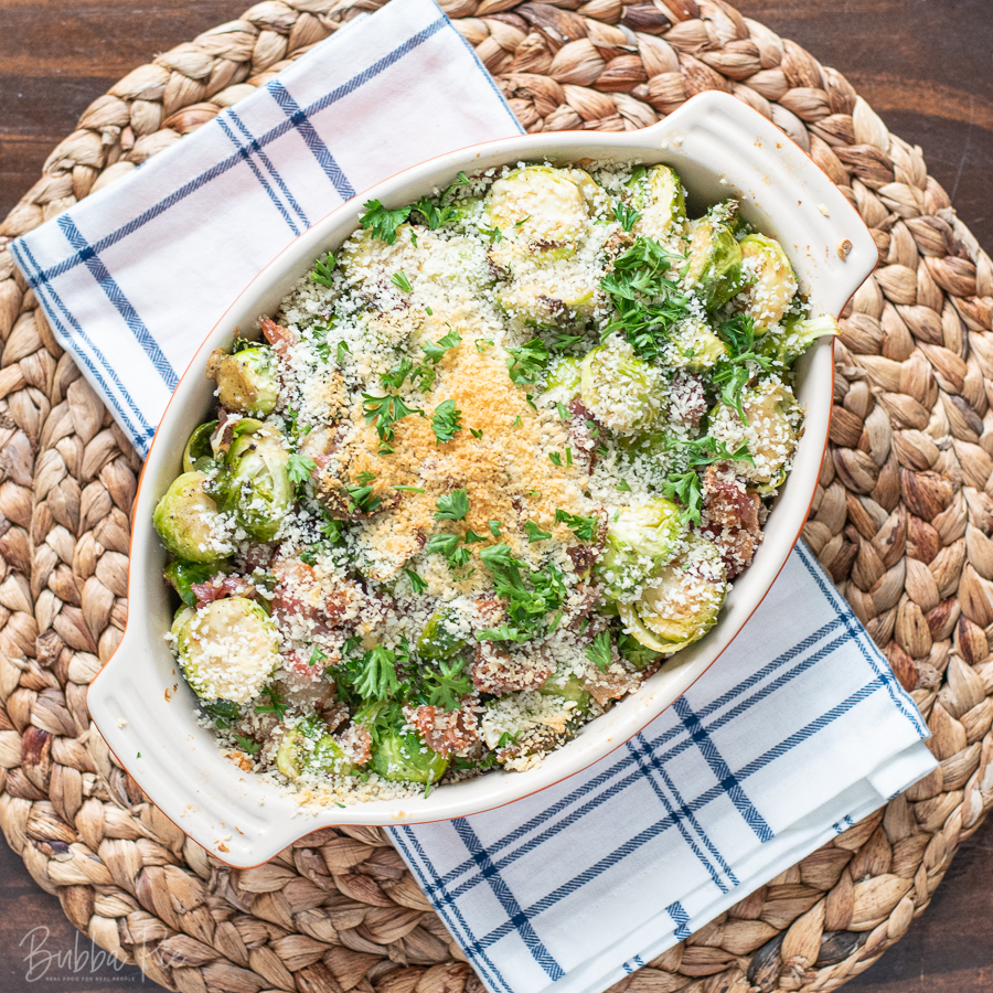 Cheesy Brussel Sprouts Casserole being served as a side dish.