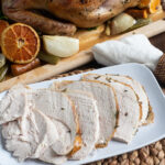 Herb Butter Turkey being served for Thanksgiving Dinner.