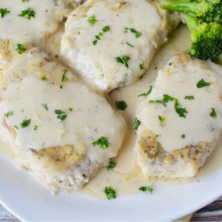 Crockpot Ranch Pork Chops being served as a family dinner.