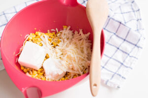 Add cream cheese, Greek yogurt and cheese to corn dip