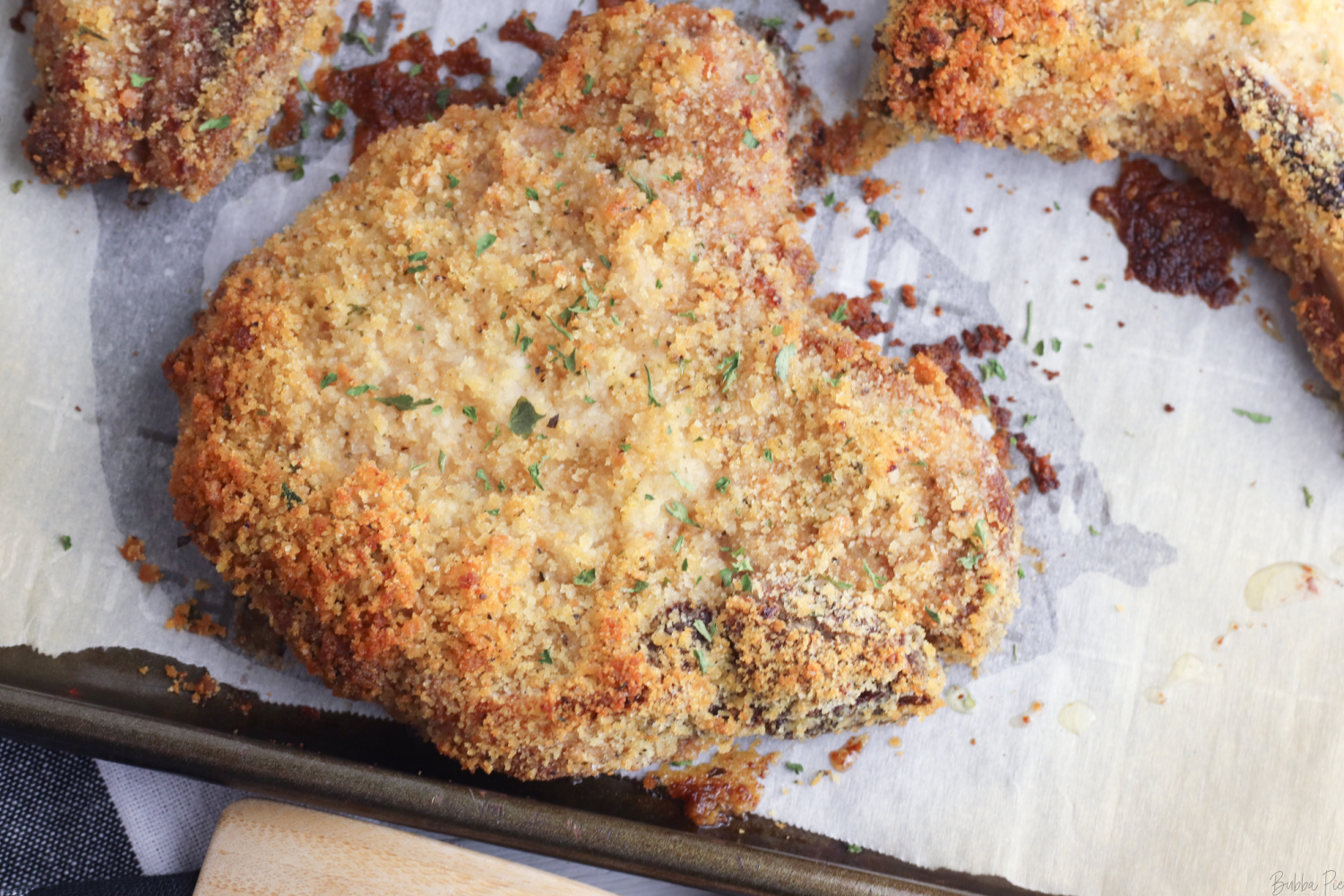 Shake n Bake Pork Chops being baked in an oven.