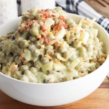 Pea Salad Classic Recipe on a table being served as side dish.