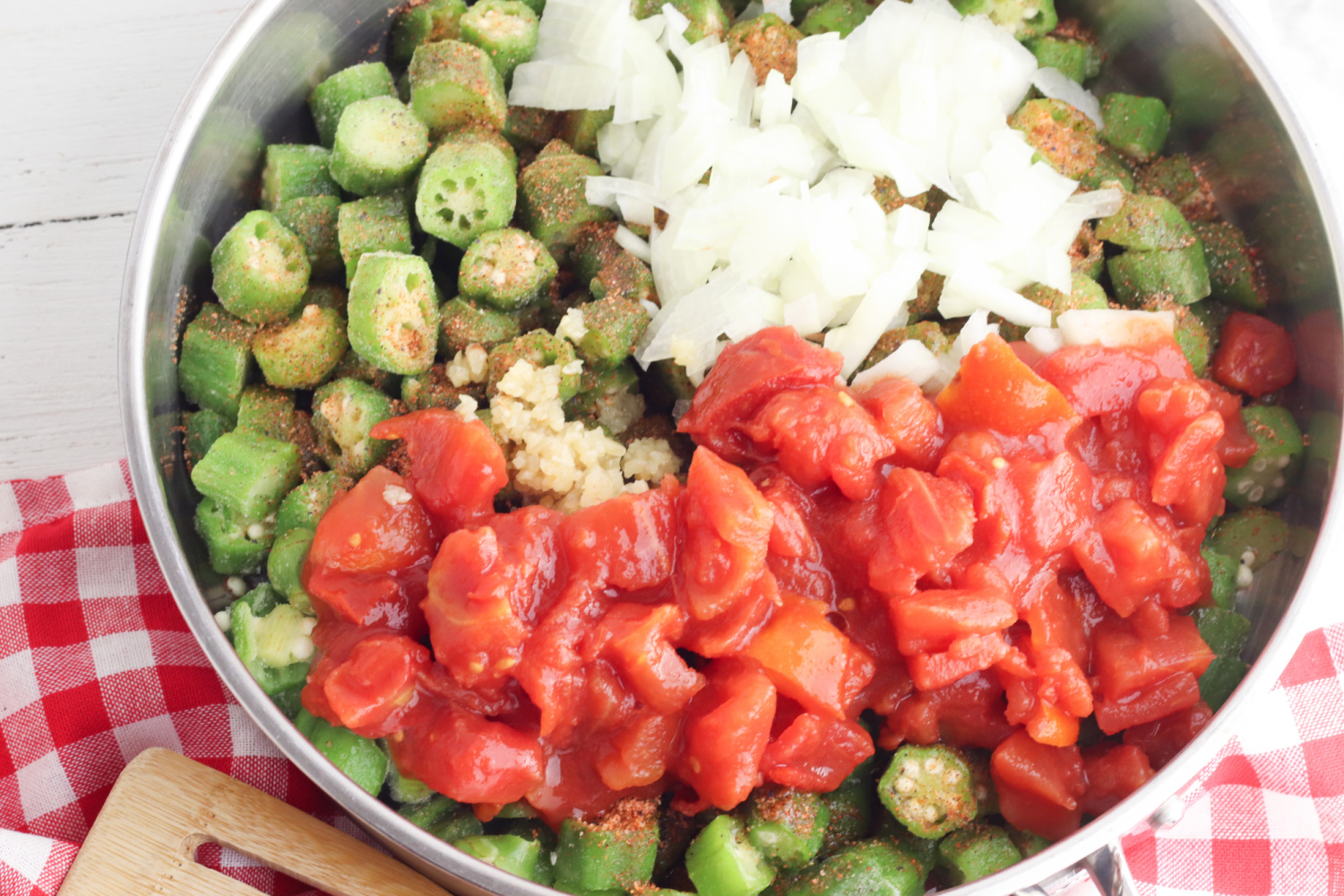 Smothered Okra Ingredients include tomatoes, garlic and onions. 