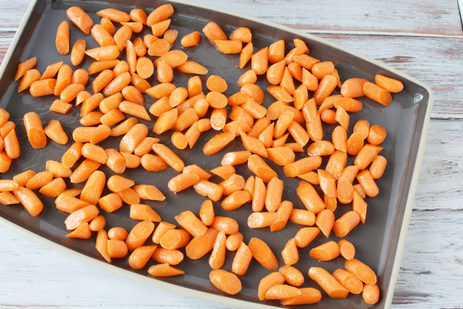 Carrots going into oven.