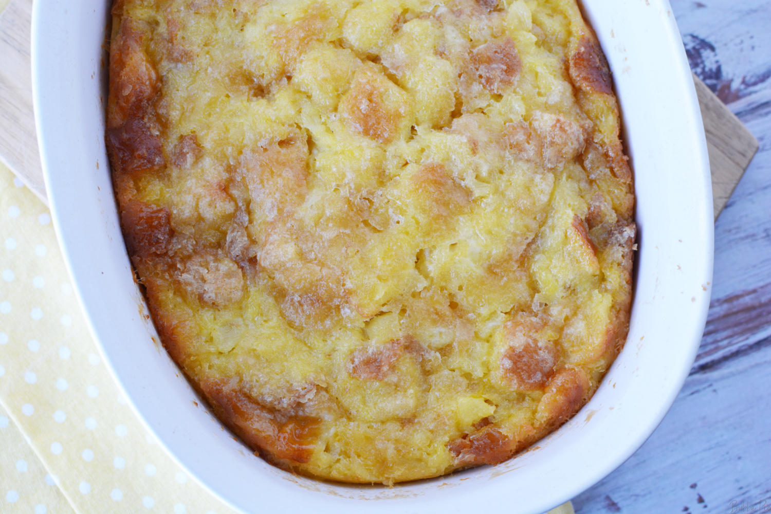 Pineapple Souffle Recipe out of the oven in a casserole dish.
