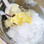 Add powdered sugar and pineapple