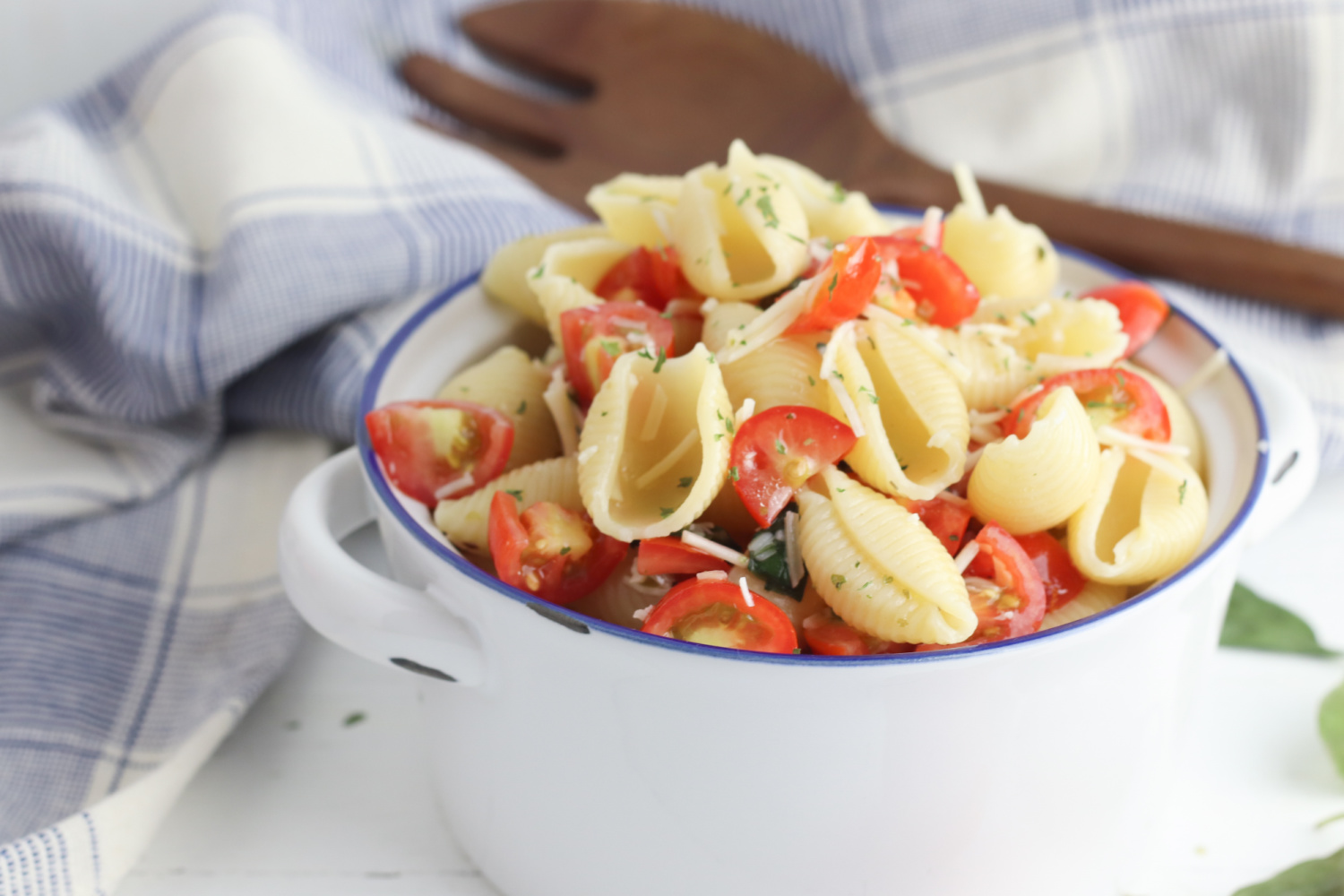 Bruschetta Pasta Salad sitting in a white bowl.